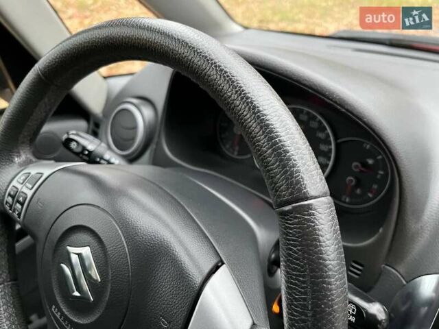 Красный Сузуки СХ4, объемом двигателя 1.6 л и пробегом 101 тыс. км за 7700 $, фото 8 на Automoto.ua