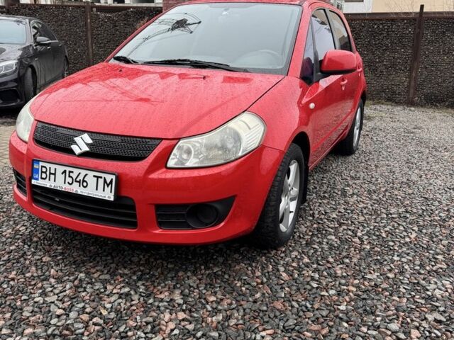 Красный Сузуки СХ4, объемом двигателя 1.6 л и пробегом 183 тыс. км за 6700 $, фото 3 на Automoto.ua
