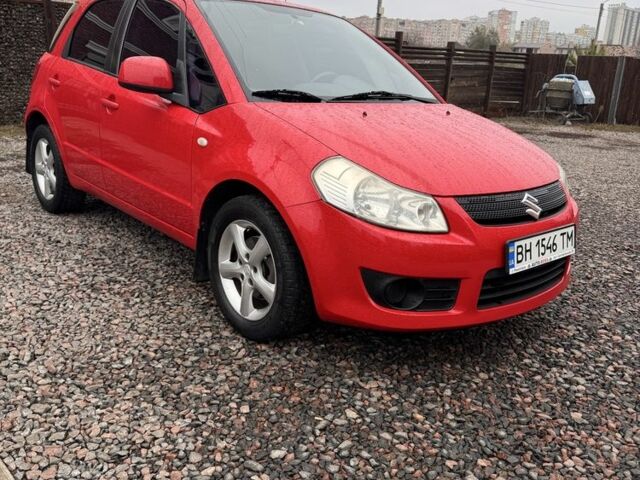 Красный Сузуки СХ4, объемом двигателя 1.6 л и пробегом 183 тыс. км за 6700 $, фото 4 на Automoto.ua