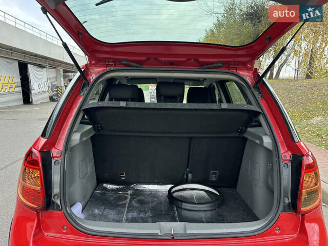Сузуки СХ4 2008 в Киеве на Automoto.ua Красный Сузуки СХ4, объемом двигателя 1.6 л и пробегом 170 тыс. км за 7550 $, фото 36 на Automoto.ua