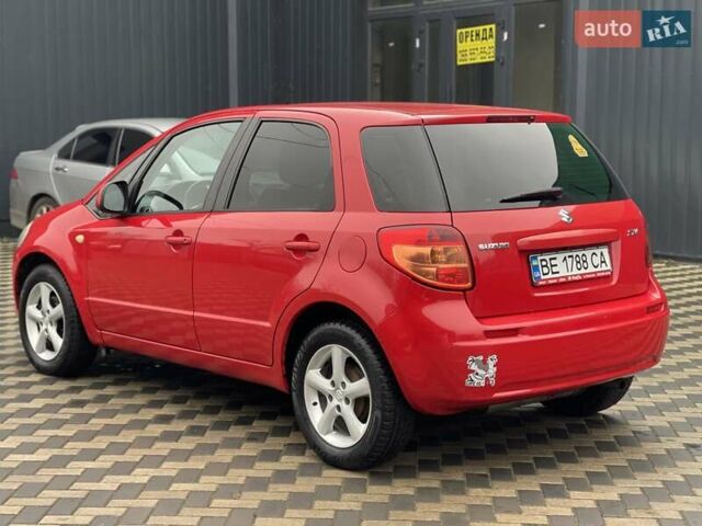 Красный Сузуки СХ4, объемом двигателя 1.59 л и пробегом 191 тыс. км за 5999 $, фото 6 на Automoto.ua