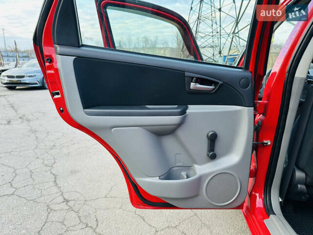 Красный Сузуки СХ4, объемом двигателя 1.6 л и пробегом 180 тыс. км за 7900 $, фото 16 на Automoto.ua