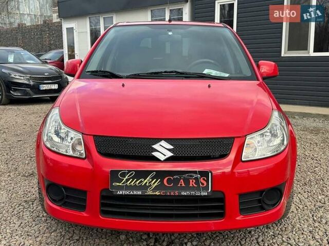 Красный Сузуки СХ4, объемом двигателя 1.6 л и пробегом 183 тыс. км за 6500 $, фото 1 на Automoto.ua