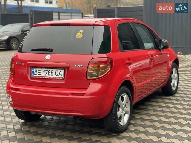 Красный Сузуки СХ4, объемом двигателя 1.59 л и пробегом 191 тыс. км за 5999 $, фото 3 на Automoto.ua