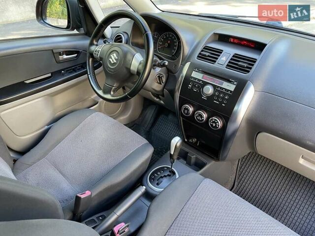Красный Сузуки СХ4, объемом двигателя 1.6 л и пробегом 145 тыс. км за 7500 $, фото 21 на Automoto.ua