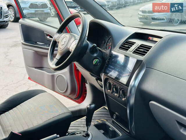 Красный Сузуки СХ4, объемом двигателя 1.6 л и пробегом 180 тыс. км за 7900 $, фото 22 на Automoto.ua