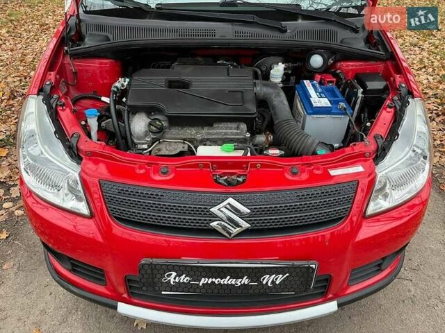 Красный Сузуки СХ4, объемом двигателя 1.6 л и пробегом 101 тыс. км за 7700 $, фото 18 на Automoto.ua