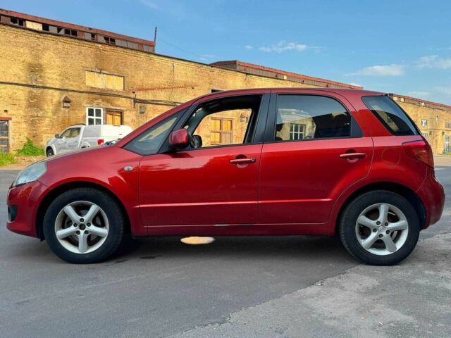 Красный Сузуки СХ4, объемом двигателя 1.6 л и пробегом 281 тыс. км за 5190 $, фото 4 на Automoto.ua