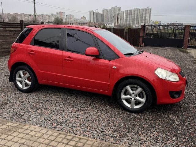 Красный Сузуки СХ4, объемом двигателя 1.6 л и пробегом 183 тыс. км за 6700 $, фото 2 на Automoto.ua