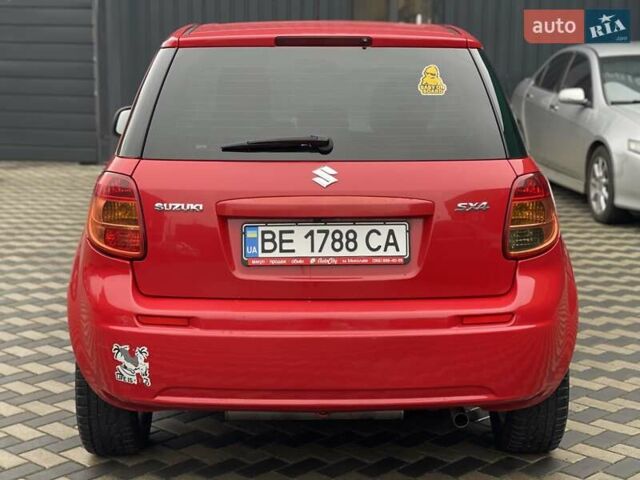 Красный Сузуки СХ4, объемом двигателя 1.59 л и пробегом 191 тыс. км за 5999 $, фото 4 на Automoto.ua