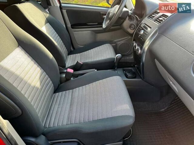 Червоний Сузукі СХ4, об'ємом двигуна 1.6 л та пробігом 101 тис. км за 7700 $, фото 15 на Automoto.ua