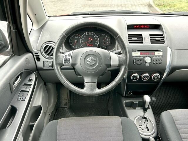 Красный Сузуки СХ4, объемом двигателя 1.6 л и пробегом 239 тыс. км за 7500 $, фото 16 на Automoto.ua