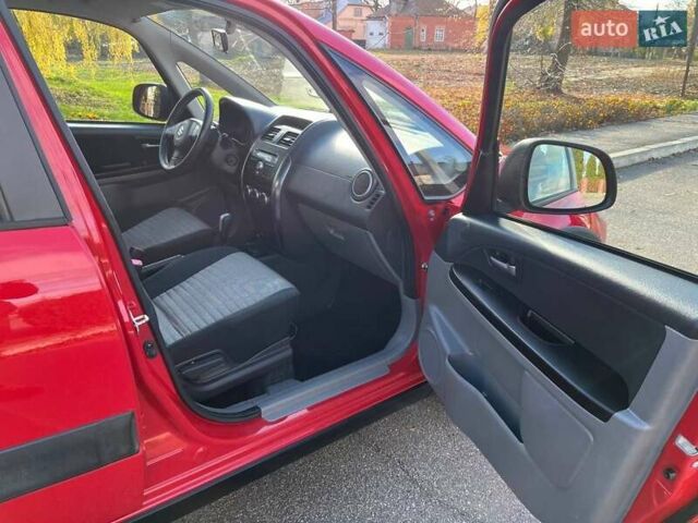 Червоний Сузукі СХ4, об'ємом двигуна 1.6 л та пробігом 101 тис. км за 7700 $, фото 14 на Automoto.ua