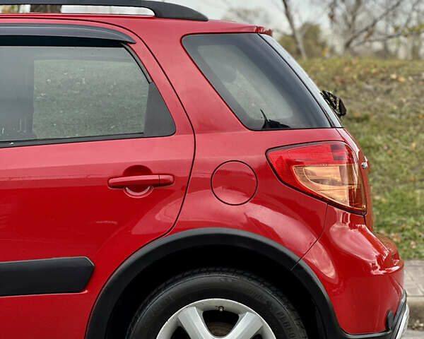 Сузуки СХ4 2008 в Киеве на Automoto.ua Красный Сузуки СХ4, объемом двигателя 1.6 л и пробегом 170 тыс. км за 7550 $, фото 14 на Automoto.ua