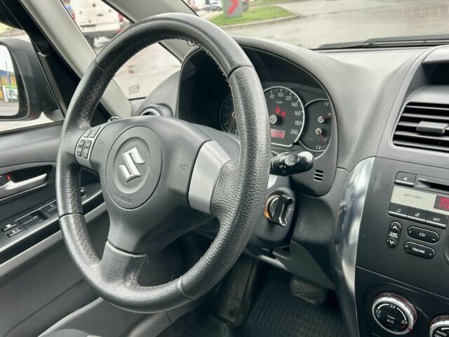 Красный Сузуки СХ4, объемом двигателя 1.6 л и пробегом 239 тыс. км за 7500 $, фото 19 на Automoto.ua