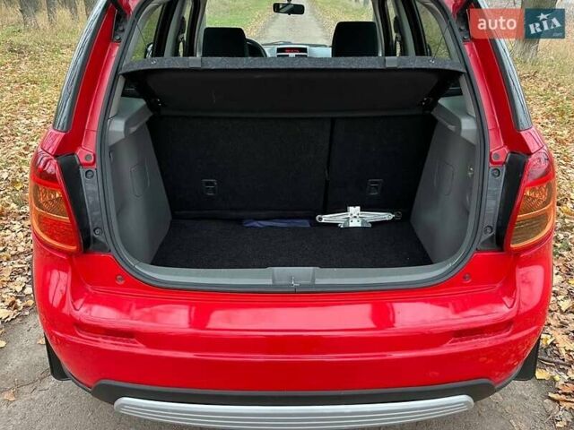 Красный Сузуки СХ4, объемом двигателя 1.6 л и пробегом 101 тыс. км за 7700 $, фото 16 на Automoto.ua