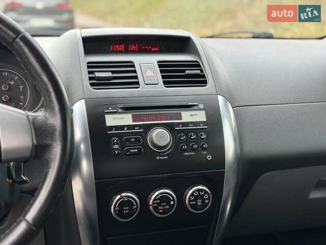 Сузуки СХ4 2008 в Киеве на Automoto.ua Красный Сузуки СХ4, объемом двигателя 1.6 л и пробегом 170 тыс. км за 7550 $, фото 34 на Automoto.ua