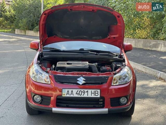 Червоний Сузукі СХ4, об'ємом двигуна 1.6 л та пробігом 145 тис. км за 7600 $, фото 9 на Automoto.ua