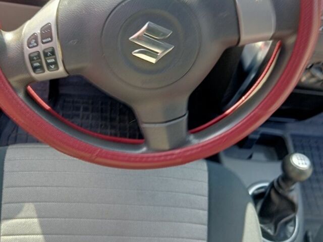 Красный Сузуки СХ4, объемом двигателя 1.6 л и пробегом 222 тыс. км за 6300 $, фото 7 на Automoto.ua