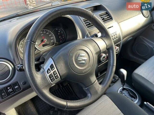 Червоний Сузукі СХ4, об'ємом двигуна 1.6 л та пробігом 101 тис. км за 7700 $, фото 10 на Automoto.ua