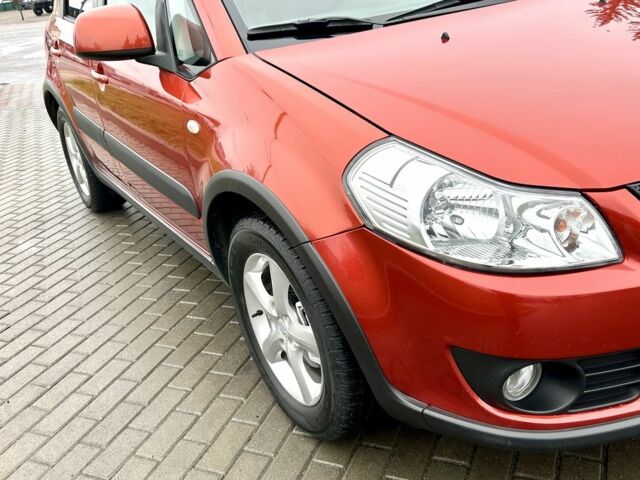 Красный Сузуки СХ4, объемом двигателя 1.6 л и пробегом 239 тыс. км за 7500 $, фото 7 на Automoto.ua