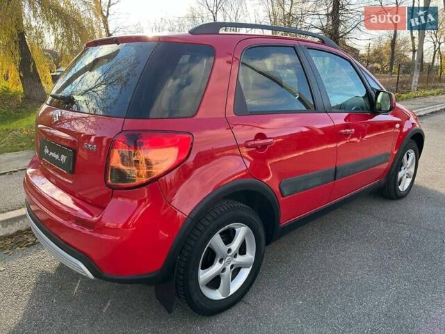 Червоний Сузукі СХ4, об'ємом двигуна 1.6 л та пробігом 101 тис. км за 7700 $, фото 7 на Automoto.ua