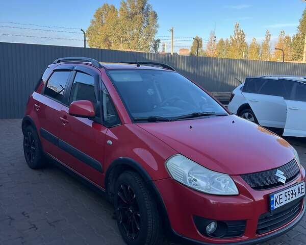 Красный Сузуки СХ4, объемом двигателя 1.6 л и пробегом 200 тыс. км за 7100 $, фото 2 на Automoto.ua