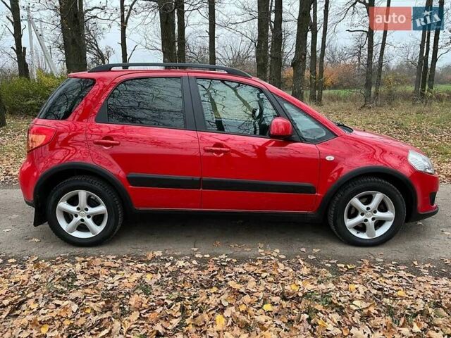 Красный Сузуки СХ4, объемом двигателя 1.6 л и пробегом 101 тыс. км за 7700 $, фото 4 на Automoto.ua
