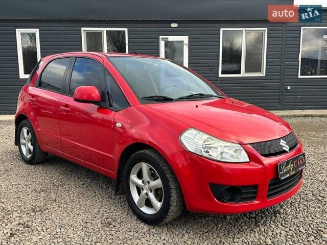 Красный Сузуки СХ4, объемом двигателя 1.6 л и пробегом 183 тыс. км за 6500 $, фото 2 на Automoto.ua