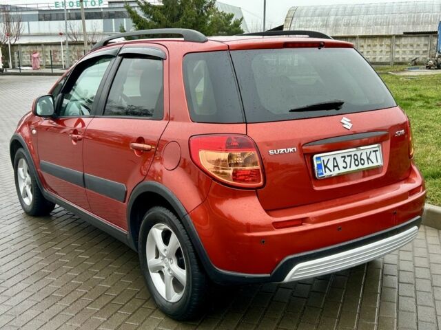 Красный Сузуки СХ4, объемом двигателя 1.6 л и пробегом 239 тыс. км за 7500 $, фото 4 на Automoto.ua