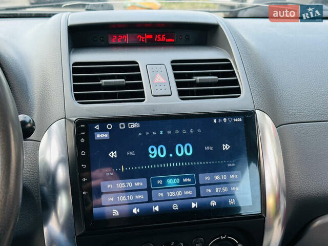 Красный Сузуки СХ4, объемом двигателя 1.6 л и пробегом 180 тыс. км за 7900 $, фото 28 на Automoto.ua