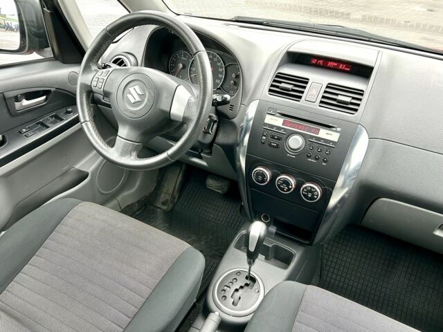 Красный Сузуки СХ4, объемом двигателя 1.6 л и пробегом 239 тыс. км за 7500 $, фото 18 на Automoto.ua