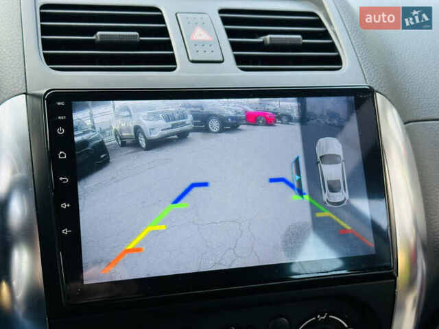 Красный Сузуки СХ4, объемом двигателя 1.6 л и пробегом 180 тыс. км за 7900 $, фото 31 на Automoto.ua