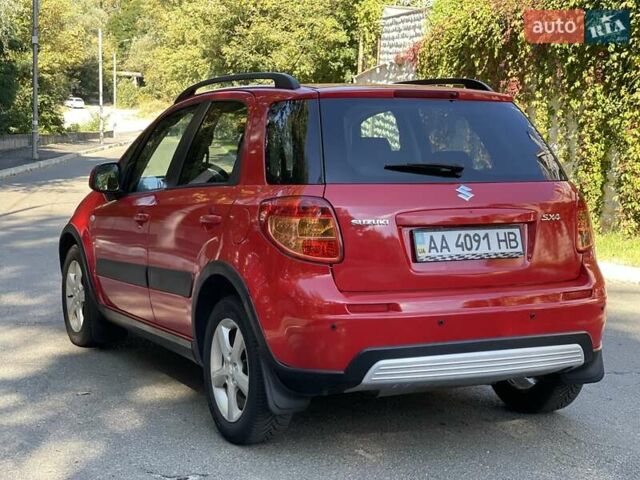 Червоний Сузукі СХ4, об'ємом двигуна 1.6 л та пробігом 145 тис. км за 7600 $, фото 6 на Automoto.ua