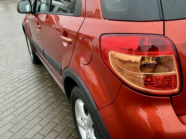 Красный Сузуки СХ4, объемом двигателя 1.6 л и пробегом 239 тыс. км за 7500 $, фото 8 на Automoto.ua