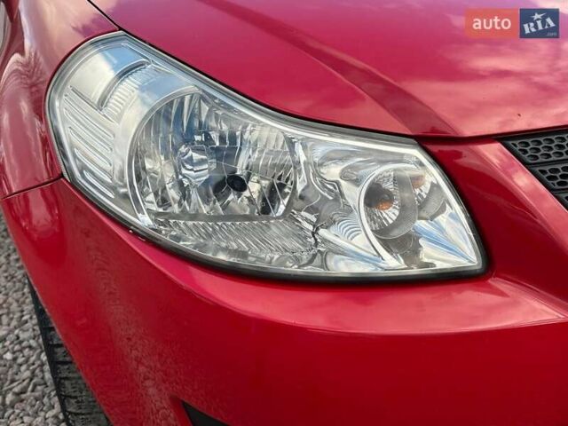 Красный Сузуки СХ4, объемом двигателя 1.6 л и пробегом 183 тыс. км за 6500 $, фото 8 на Automoto.ua