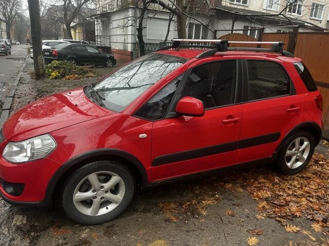 Красный Сузуки СХ4, объемом двигателя 1.6 л и пробегом 183 тыс. км за 6800 $, фото 2 на Automoto.ua