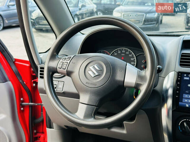 Красный Сузуки СХ4, объемом двигателя 1.6 л и пробегом 180 тыс. км за 7900 $, фото 19 на Automoto.ua