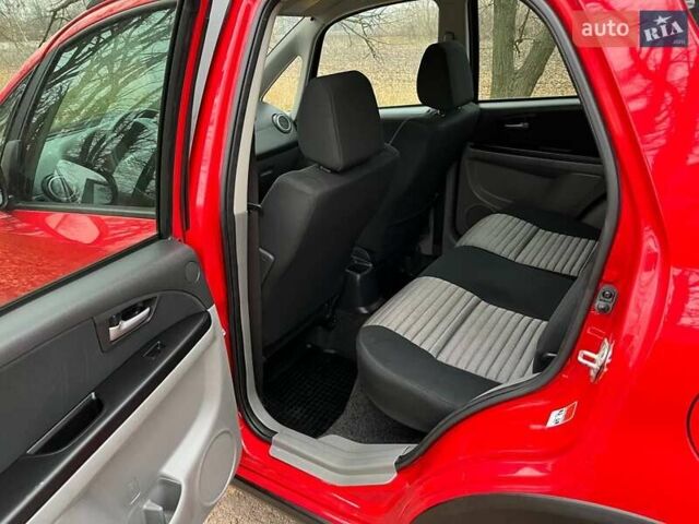 Красный Сузуки СХ4, объемом двигателя 1.6 л и пробегом 101 тыс. км за 7700 $, фото 14 на Automoto.ua