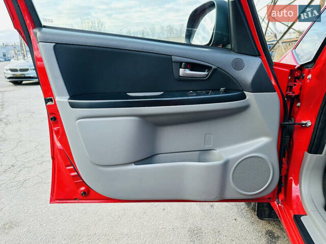 Красный Сузуки СХ4, объемом двигателя 1.6 л и пробегом 180 тыс. км за 7900 $, фото 14 на Automoto.ua