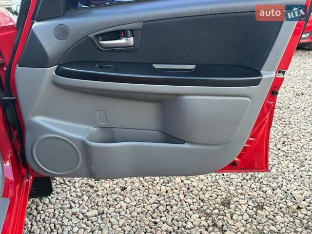 Красный Сузуки СХ4, объемом двигателя 1.6 л и пробегом 183 тыс. км за 6500 $, фото 29 на Automoto.ua