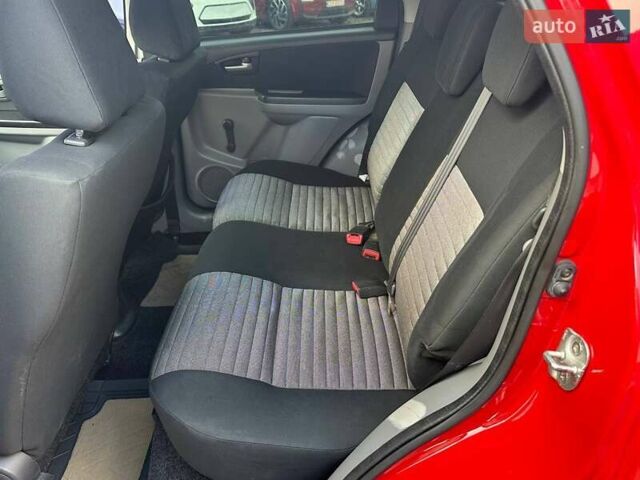 Красный Сузуки СХ4, объемом двигателя 1.6 л и пробегом 183 тыс. км за 6500 $, фото 26 на Automoto.ua