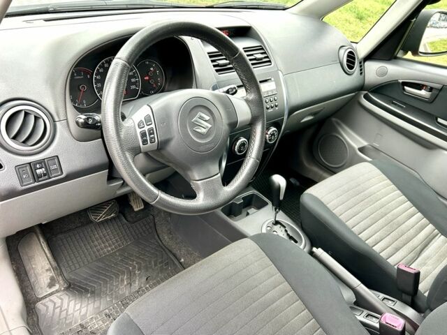 Красный Сузуки СХ4, объемом двигателя 1.6 л и пробегом 239 тыс. км за 7500 $, фото 14 на Automoto.ua