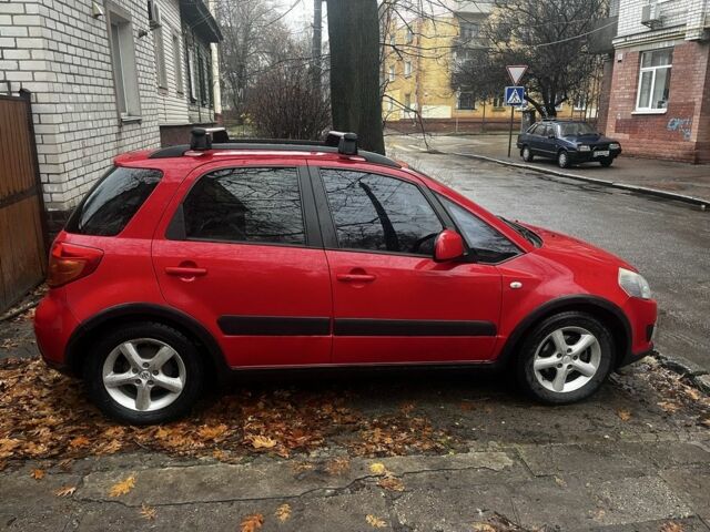 Красный Сузуки СХ4, объемом двигателя 1.6 л и пробегом 183 тыс. км за 6800 $, фото 3 на Automoto.ua