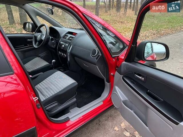 Красный Сузуки СХ4, объемом двигателя 1.6 л и пробегом 101 тыс. км за 7700 $, фото 12 на Automoto.ua