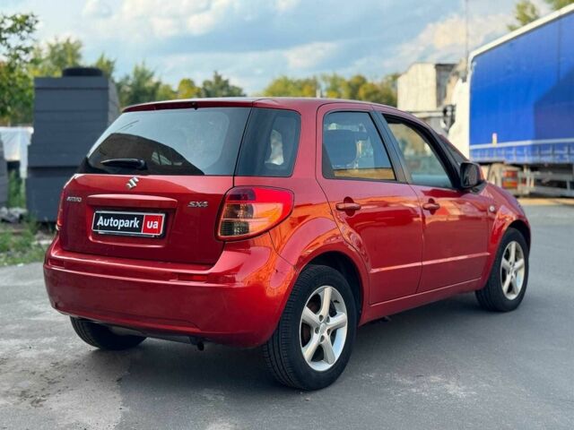 Красный Сузуки СХ4, объемом двигателя 1.6 л и пробегом 281 тыс. км за 5190 $, фото 8 на Automoto.ua