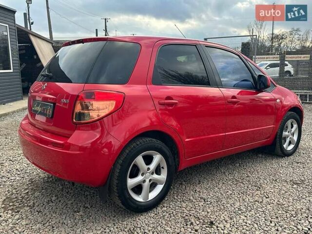 Красный Сузуки СХ4, объемом двигателя 1.6 л и пробегом 183 тыс. км за 6500 $, фото 4 на Automoto.ua