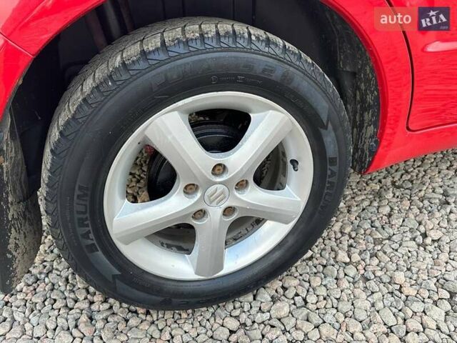 Красный Сузуки СХ4, объемом двигателя 1.6 л и пробегом 183 тыс. км за 6500 $, фото 10 на Automoto.ua