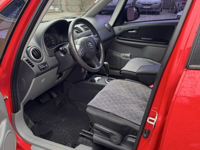 Красный Сузуки СХ4, объемом двигателя 1.6 л и пробегом 183 тыс. км за 6700 $, фото 5 на Automoto.ua