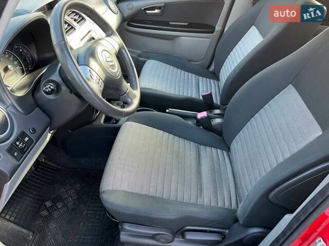 Червоний Сузукі СХ4, об'ємом двигуна 1.6 л та пробігом 101 тис. км за 7700 $, фото 5 на Automoto.ua